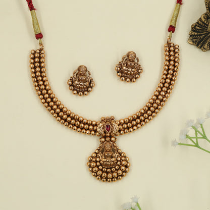Couture antique necklace featuring Lakshmi pendant design