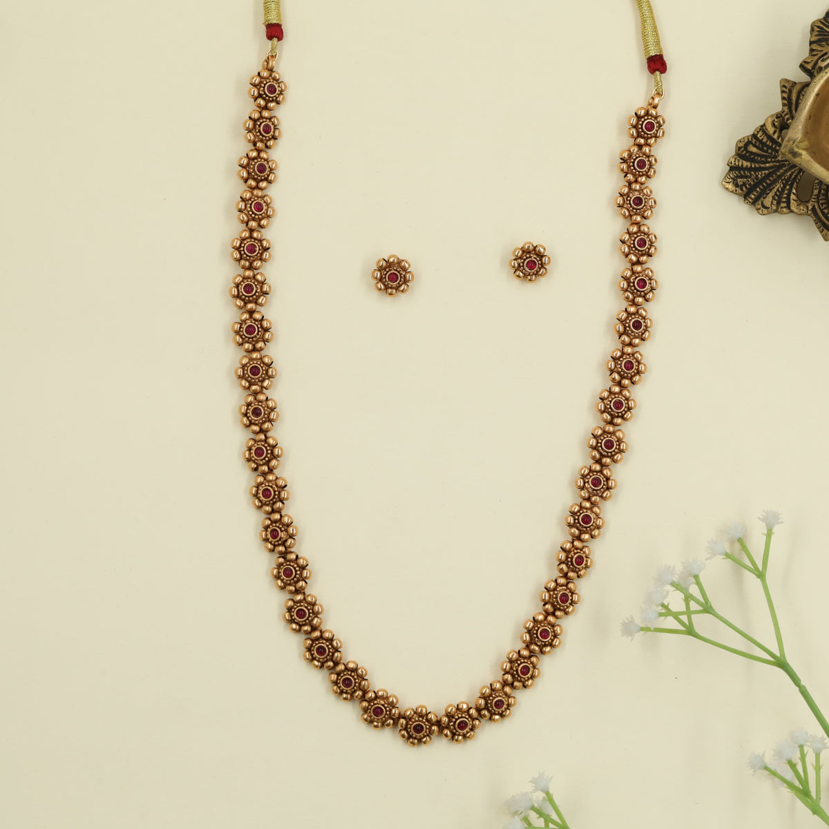 Grand antique long haara crafted with iconic floral artistry