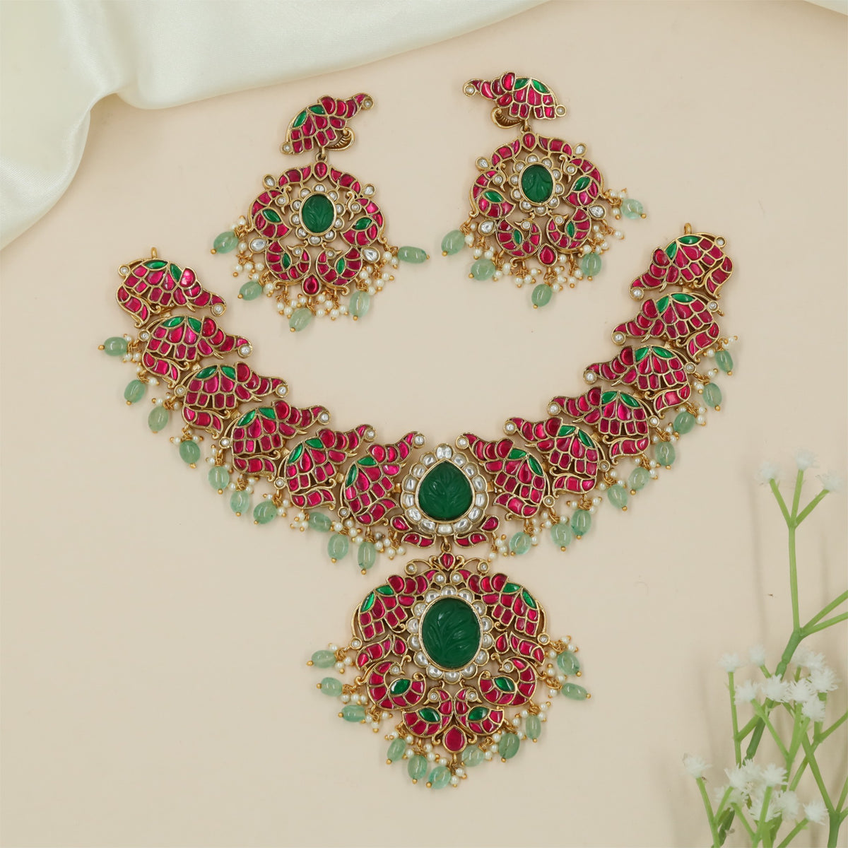 Petal shaped panels with a central drop Jadau Necklace