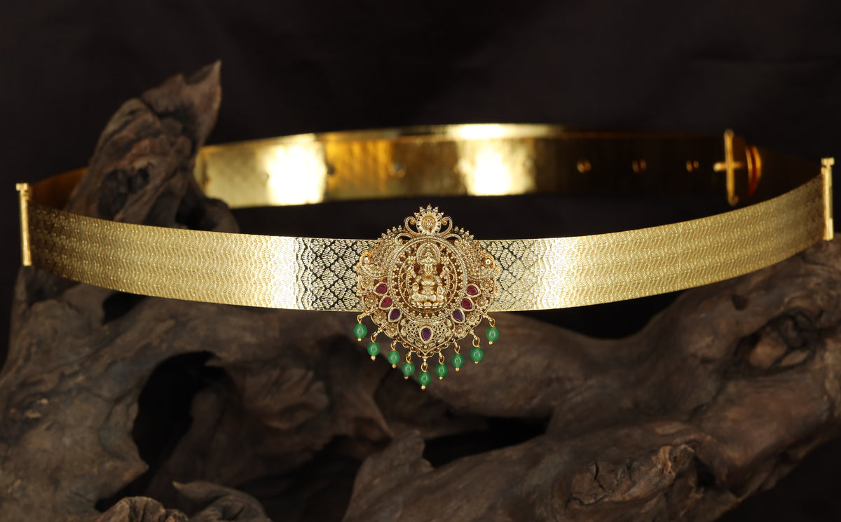 Antique Dabu with a seated Lakshmi pendant and hanging drops