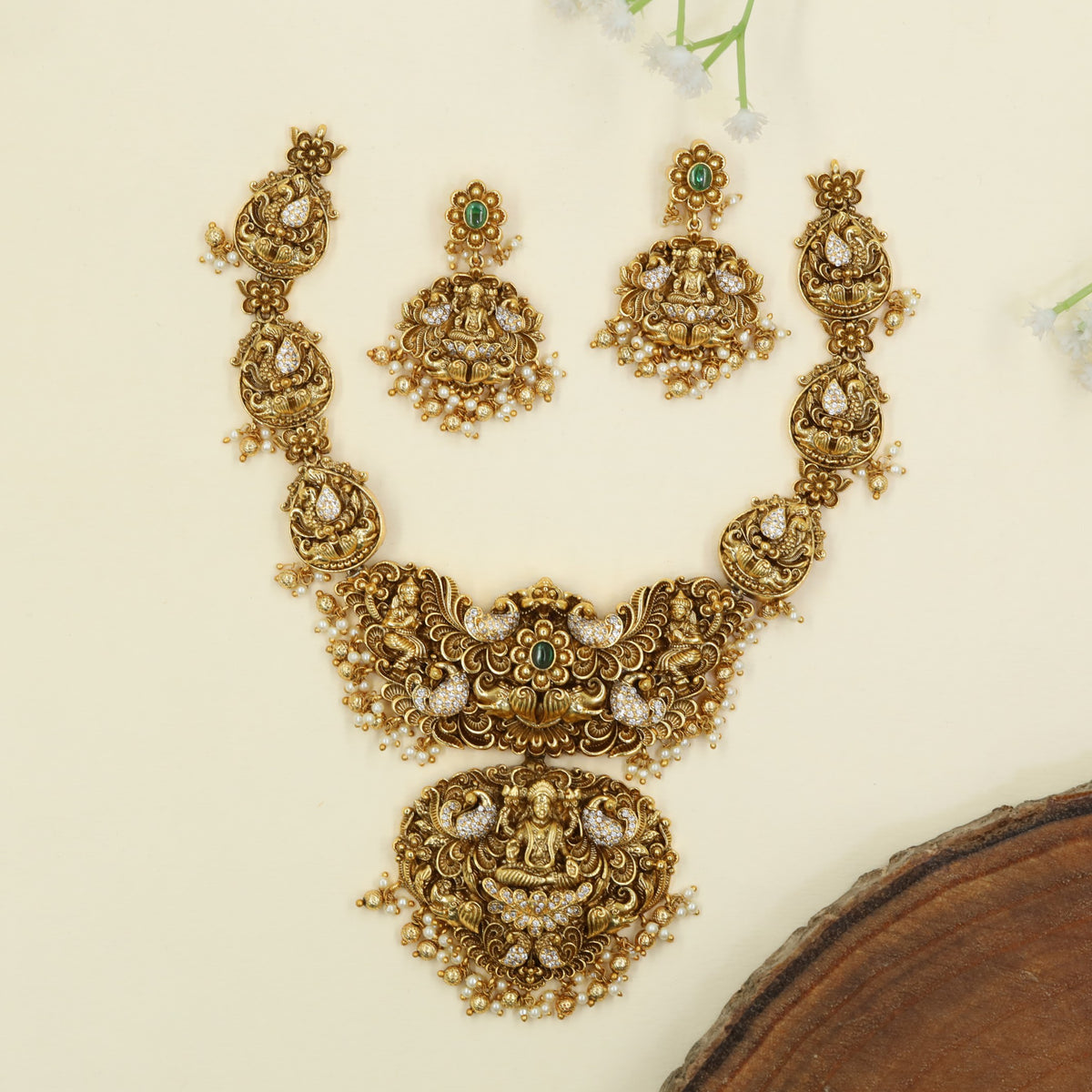 Antique Necklace featuring sculpted peacocks and an elaborate Lakshmi pendant