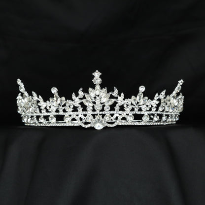 Delicate Crown featuring sculpted leaves, floral accents and symmetrical openwork