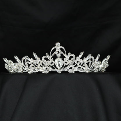 Decorative Crown Featuring Botanical Curves And Teardrop Elements
