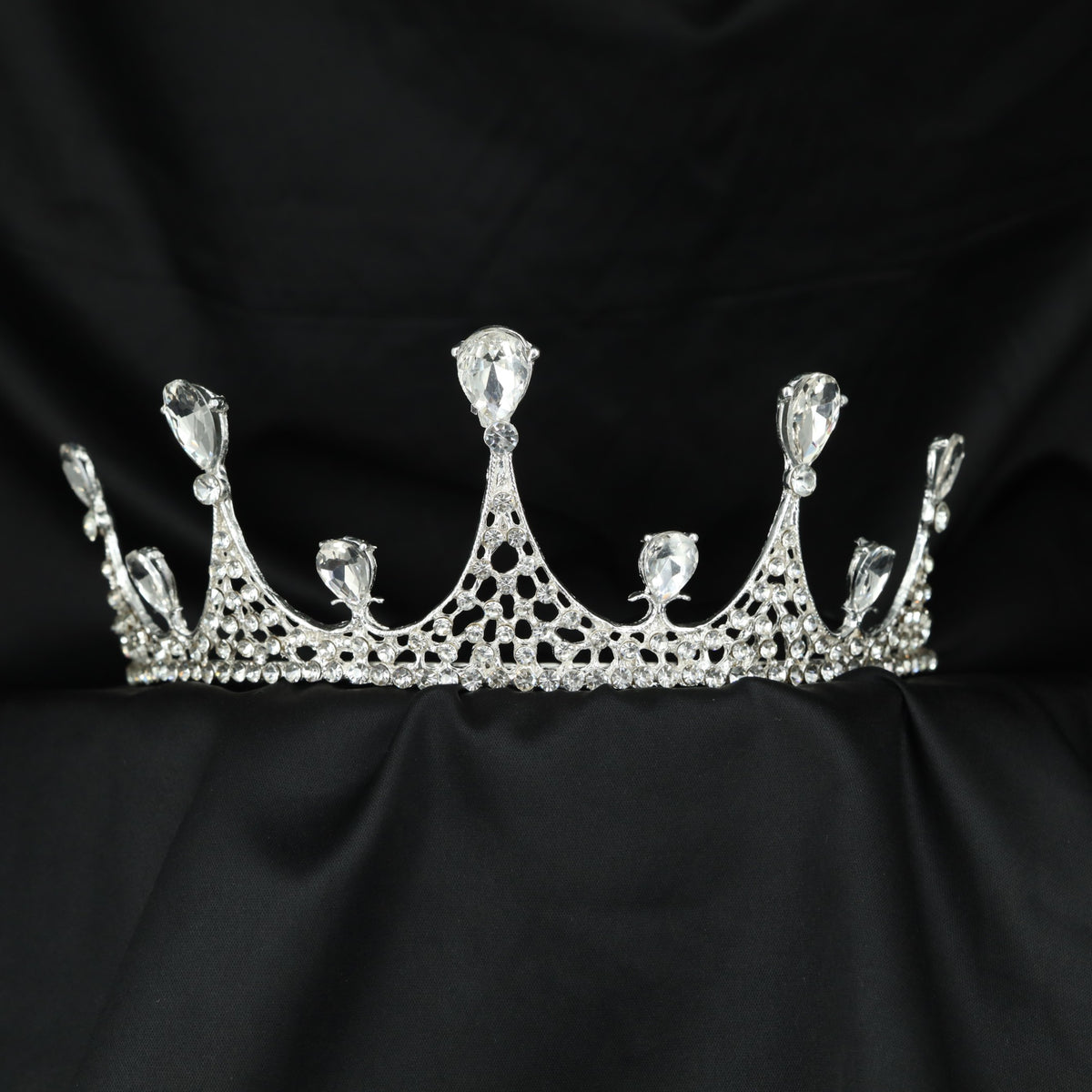 Classic Crown Showcasing Elevated Teardrop Forms And Fine Detailing