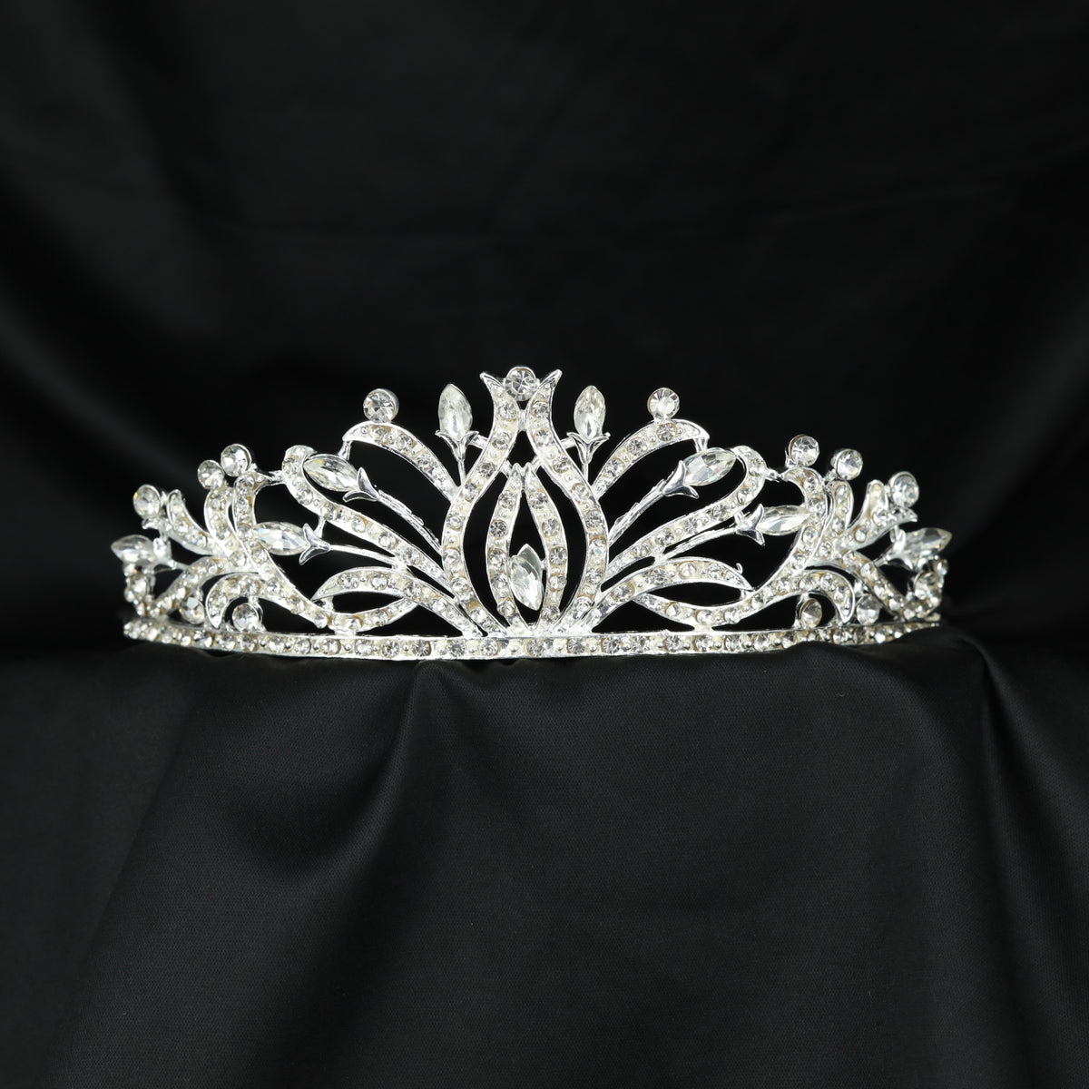 Botanical Crown Featuring Sweeping Leaf And Petal Details