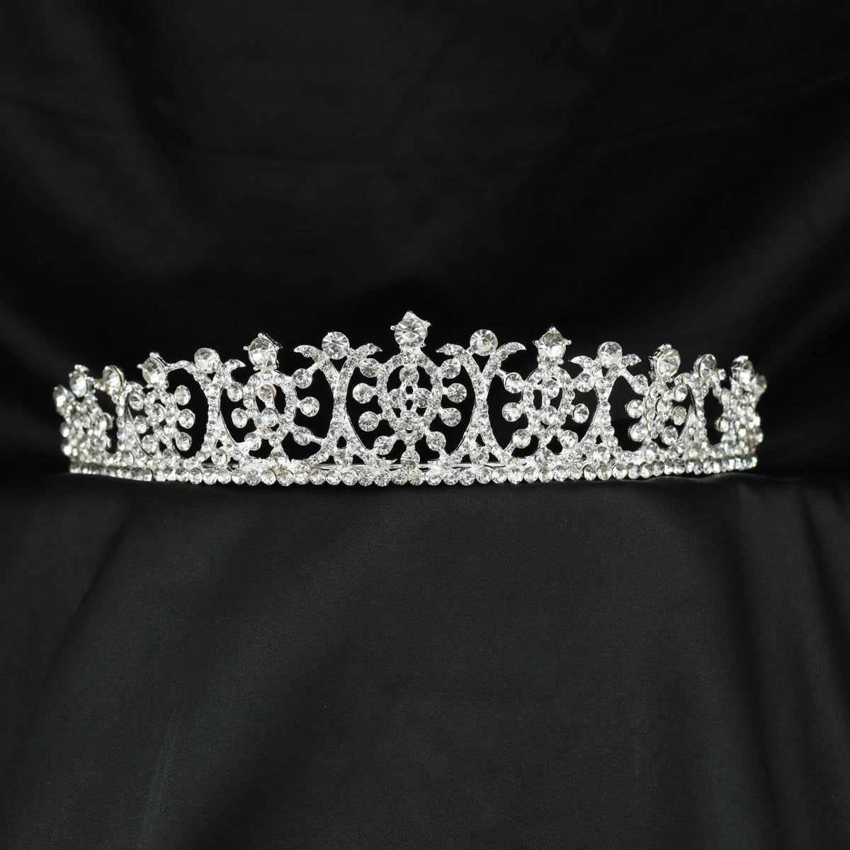 Signature Crown showcasing elegant curves and detailed central panels