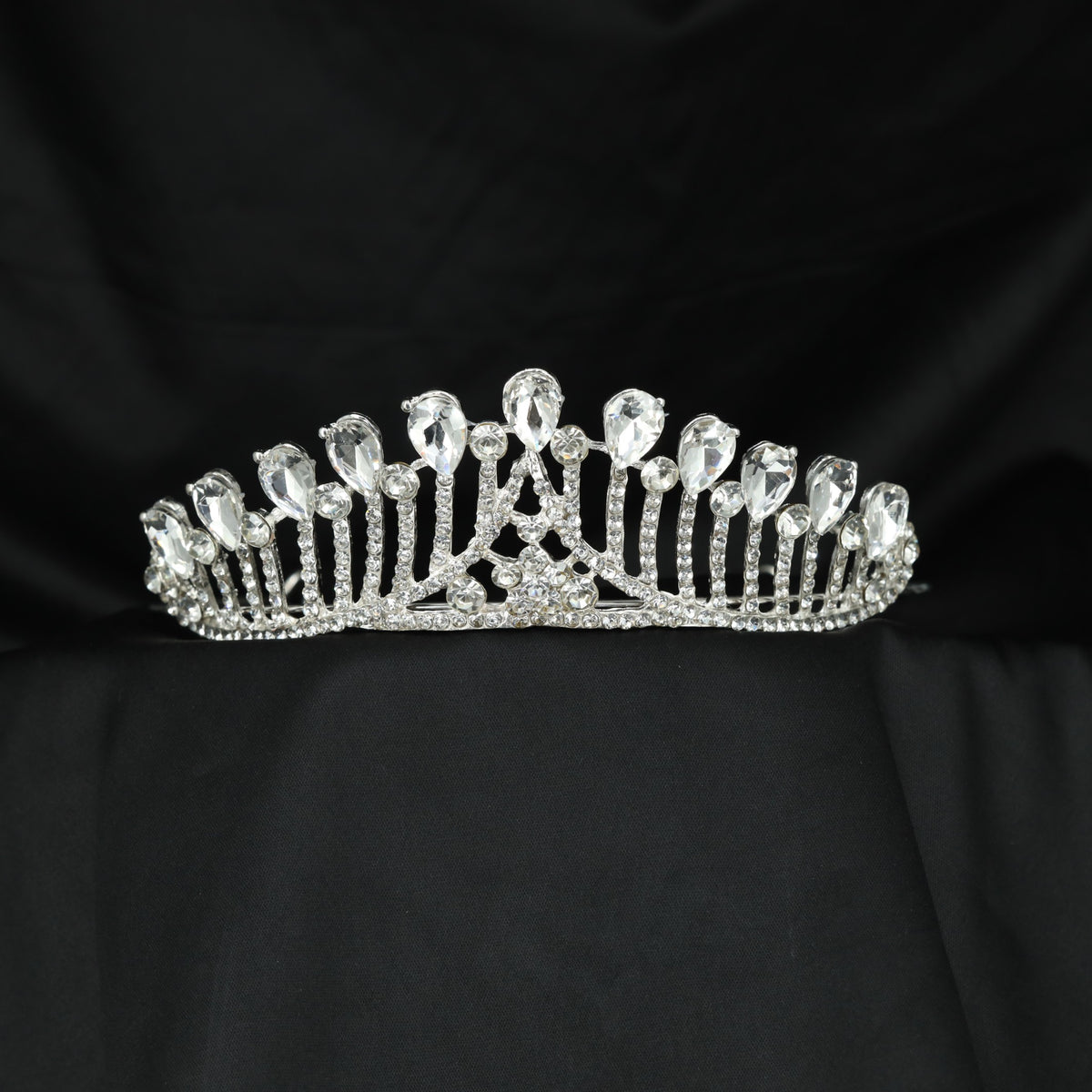 Modern Crown showcasing elongated teardrop forms and curved detailing