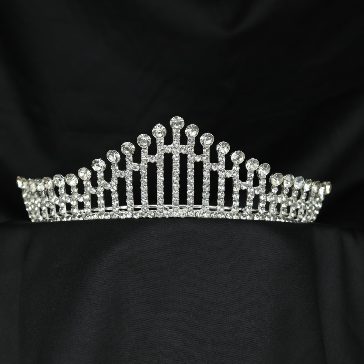 Modern Crown featuring graduated arches and raised circular details