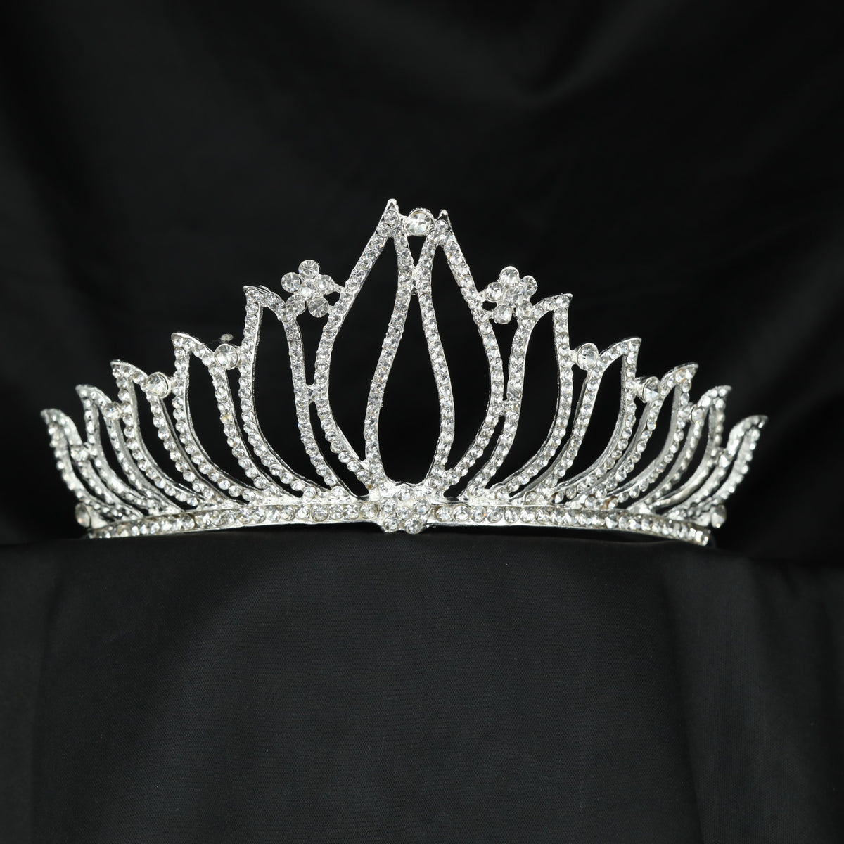 Modern Crown featuring a tall teardrop frame and curved detailing