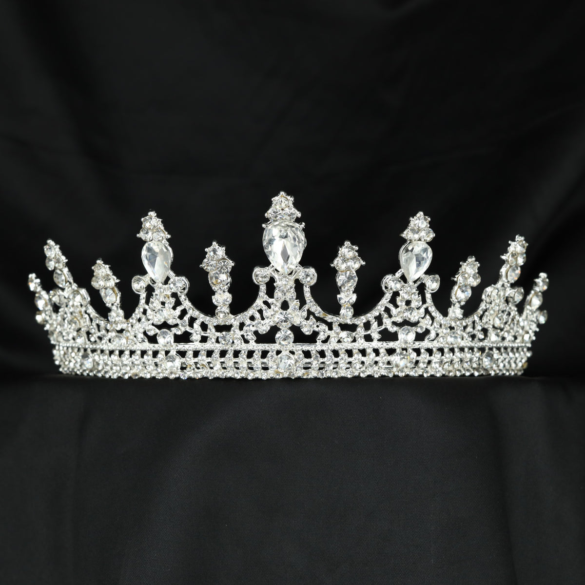 Classic Crown showcasing teardrop accents and intricate openwork construction