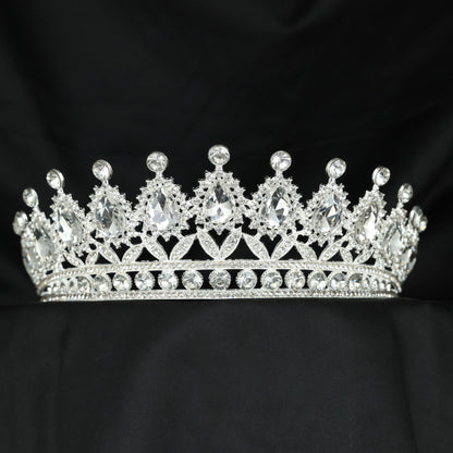 Elegant teardrop frame Crown with refined openwork detailing
