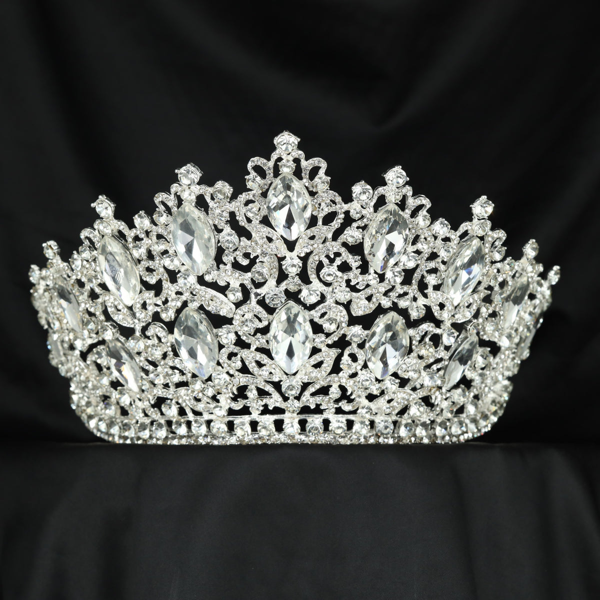 Embellished Crown featuring graceful scrollwork and balanced raised elements