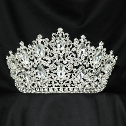 Embellished Crown featuring graceful scrollwork and balanced raised elements