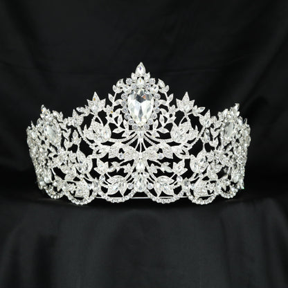 Artful Crown design featuring elegant leaf clusters and a striking central drop