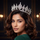 Beautifully structured Crown featuring floral arrangements and an elongated central frame