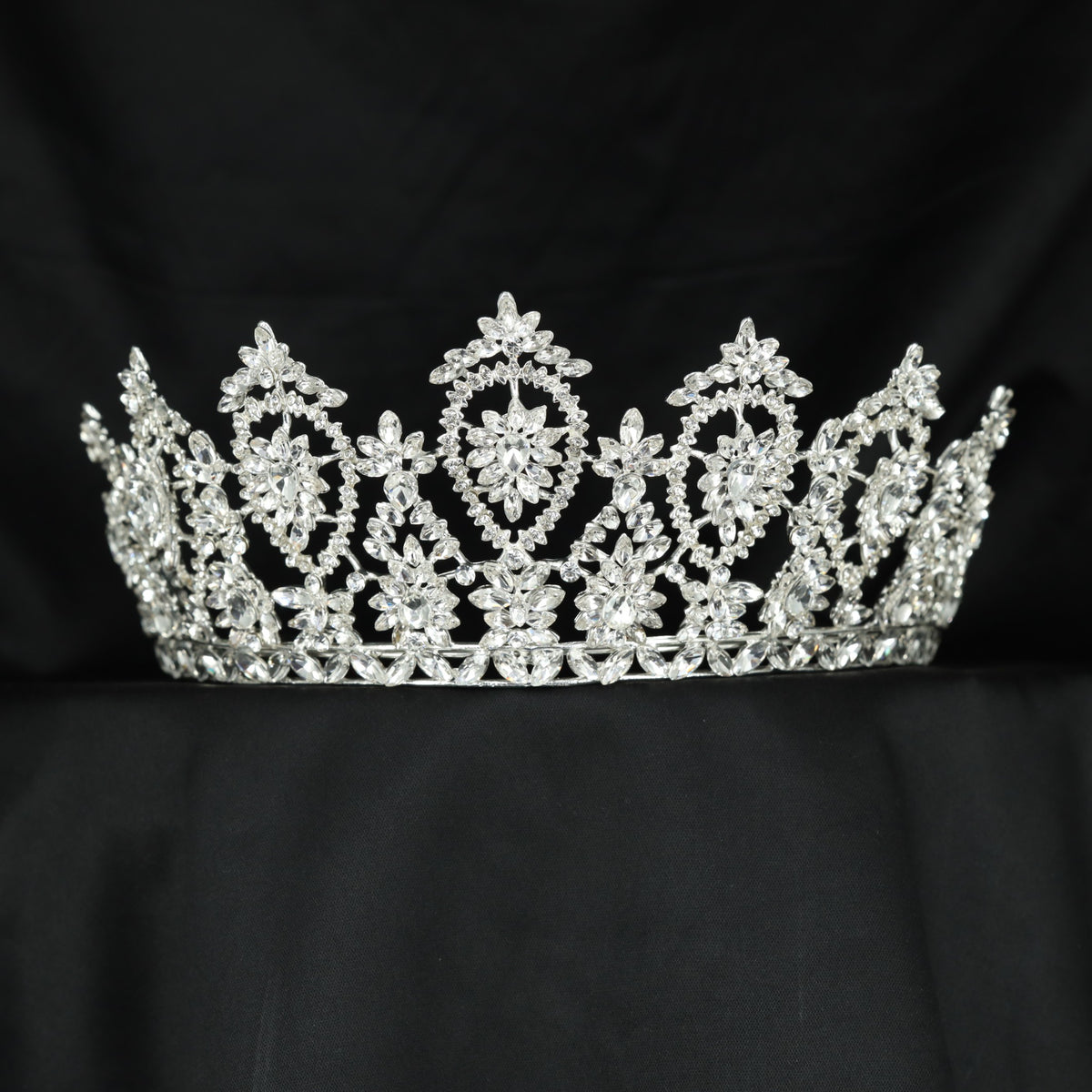 Royal wedding Crown with symmetrical flower arrangements and ornate openwork