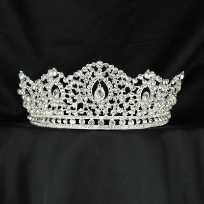 Occasion wear Crown featuring a prominent open centre with delicate surrounding details