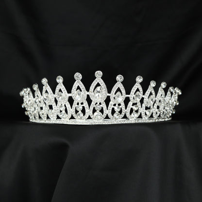 Graceful Crown featuring pointed frames, openwork sections and raised accents