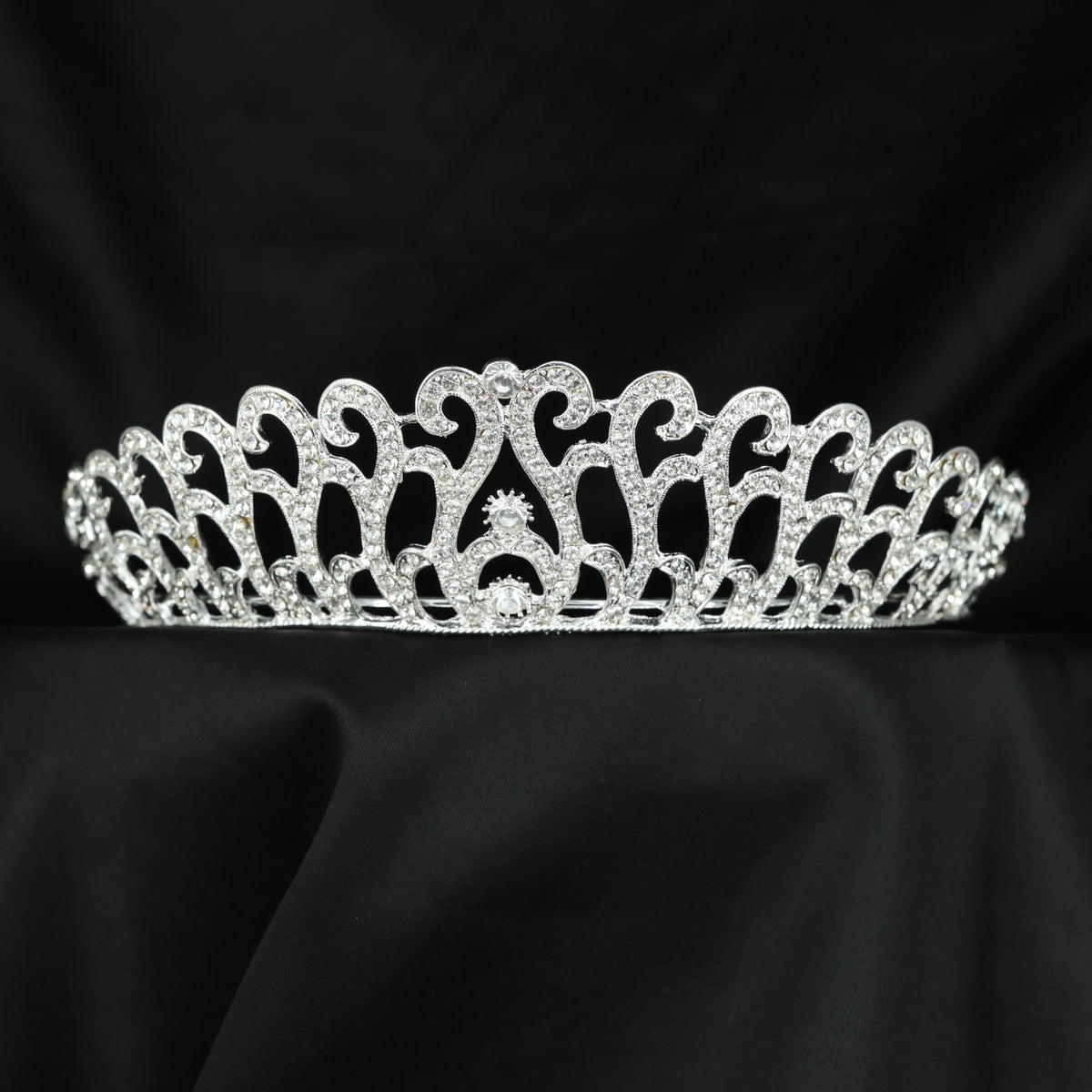 Bridal Crown showcasing repeated curling arches with a distinctive centre detail