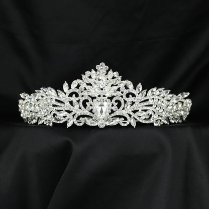 Signature Crown crafted with delicate foliage details and refined openwork