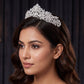 Signature Crown crafted with delicate foliage details and refined openwork