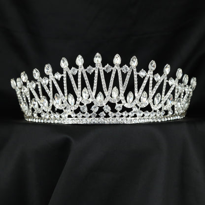 Grand Crown featuring graceful openwork arches and raised details