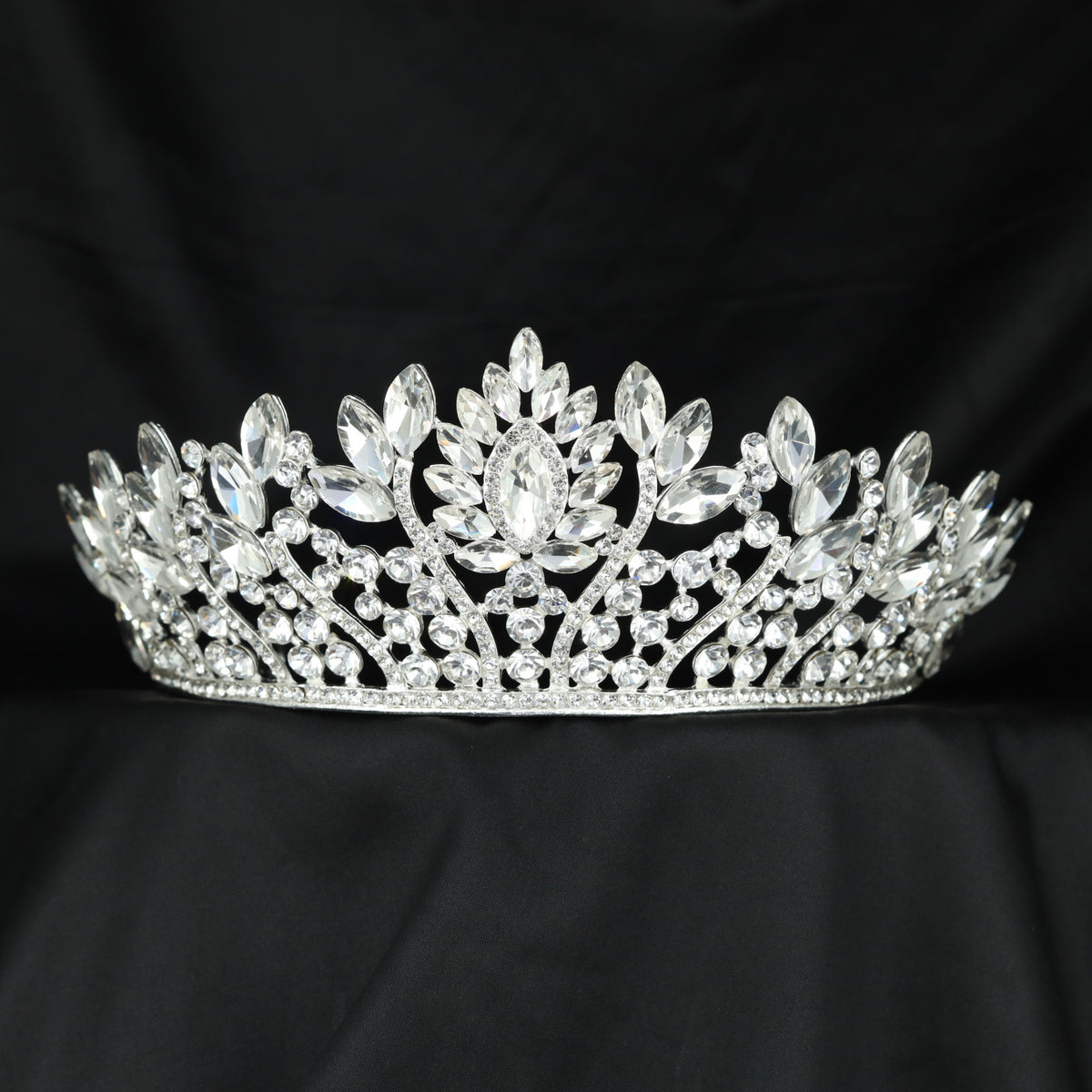 Premium Crown featuring a raised centre with graceful leaf details