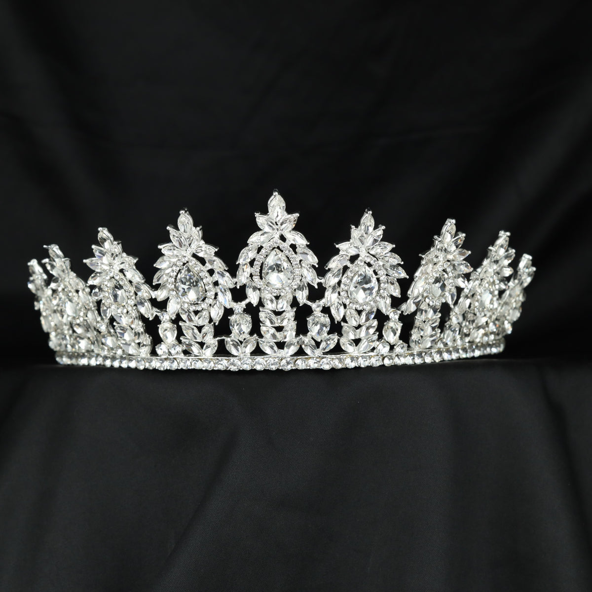 Grand wedding Crown featuring ornate floral panels and an elegant centre