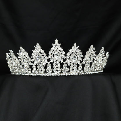 Grand wedding Crown featuring ornate floral panels and an elegant centre