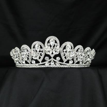 Grand Crown featuring graceful openwork arches and elongated raised details