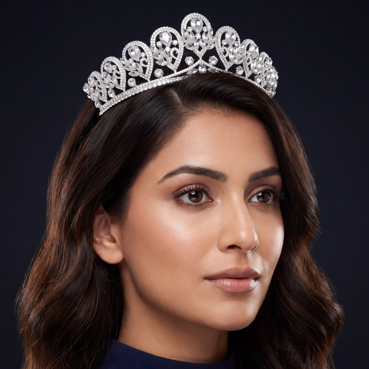 Grand Crown featuring graceful openwork arches and elongated raised details