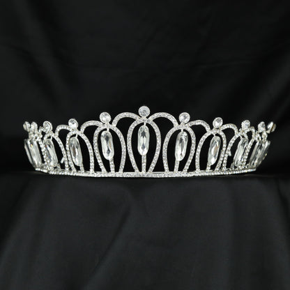 Grand Crown featuring graceful openwork arches and elongated raised details