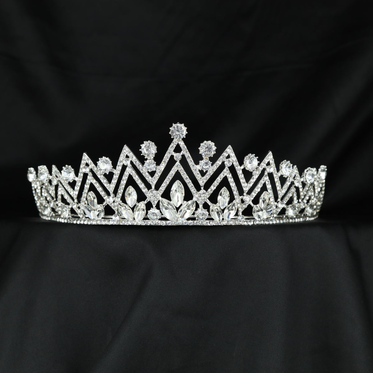 Premium Crown featuring structured arches and delicate decorative accents