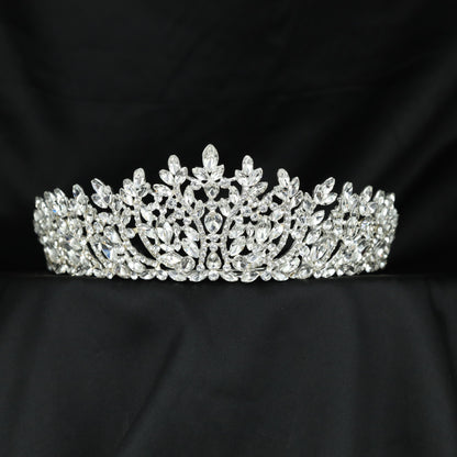 Grand Crown featuring elegant floral openwork and refined leaf accents