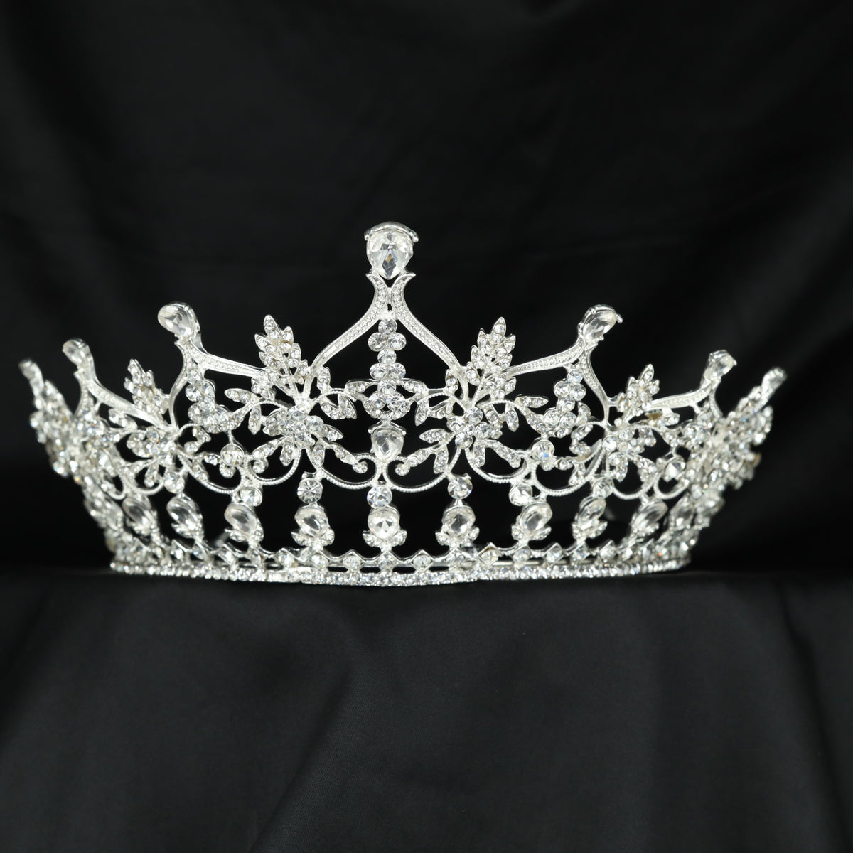 Premium Crown featuring intricate floral arrangements, flowing openwork and an elevated centre design