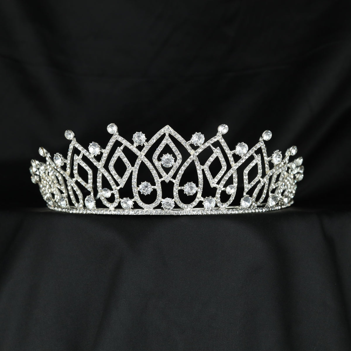Regal Crown with geometric openwork arches and elegant diamond-shaped centre details