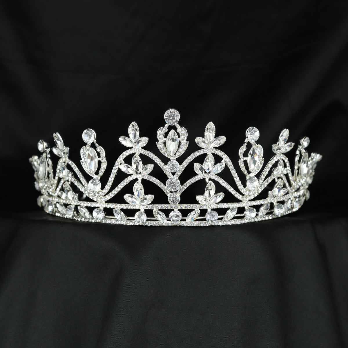 Regal Crown with intricate floral arches, delicate leaf details and an elegant raised centre