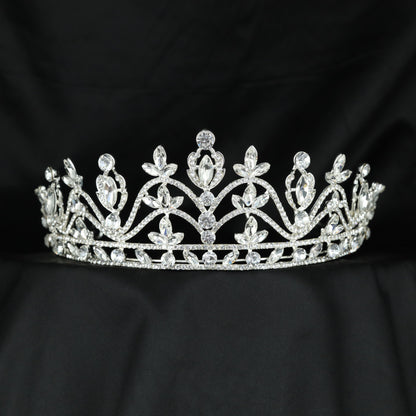 Regal Crown with intricate floral arches, delicate leaf details and an elegant raised centre
