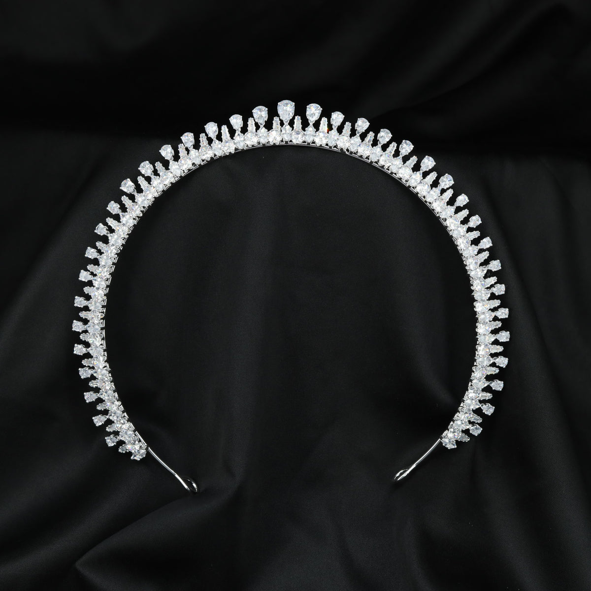 Grand wedding Crown featuring delicate upright elements and a prominent raised centre