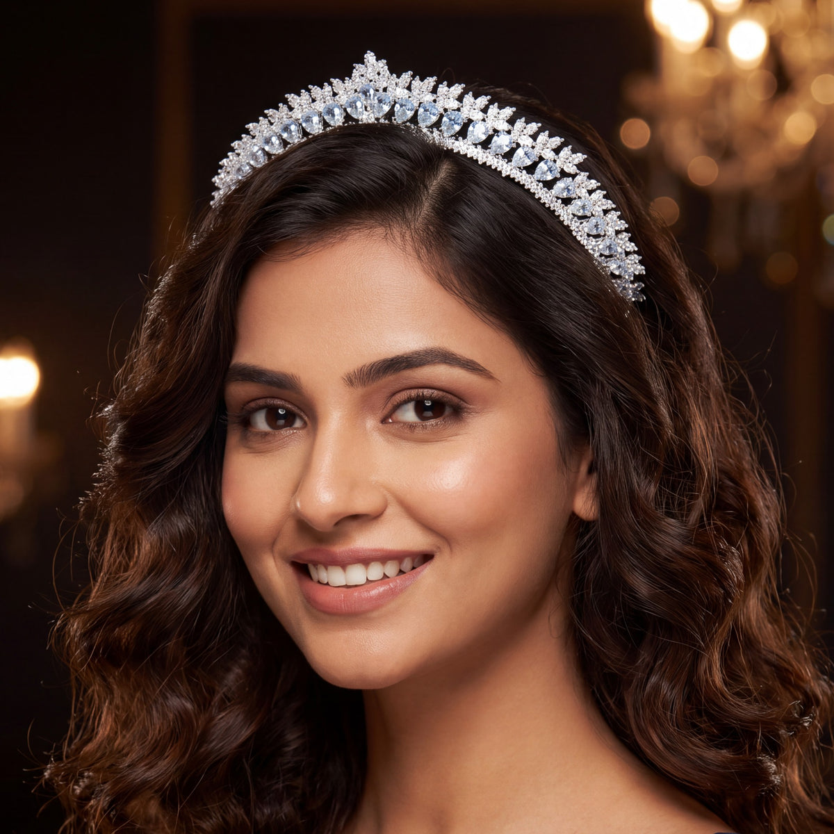 Royal Crown featuring a curved openwork band with repeating leaf-like accents