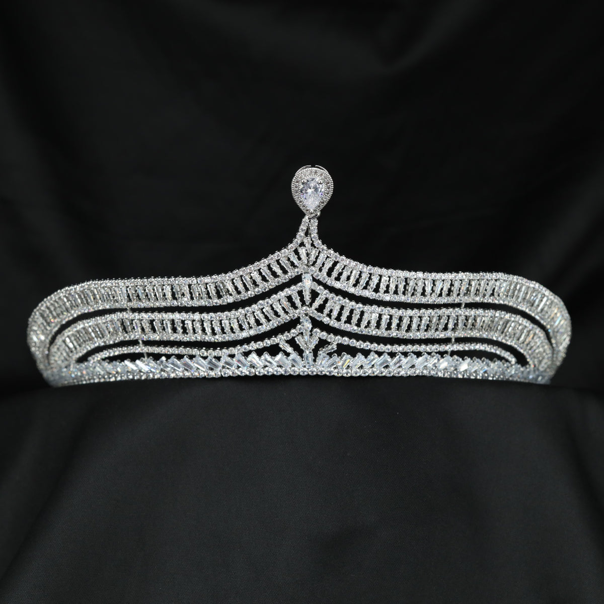 Luxurious arched crown with intricate lattice sections and an elevated symmetrical centre