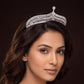 Luxurious arched crown with intricate lattice sections and an elevated symmetrical centre