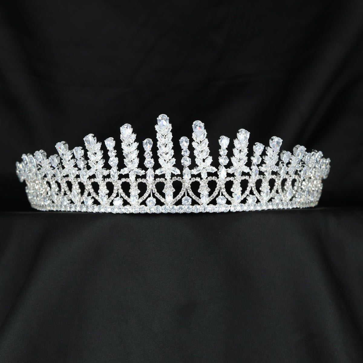 Grand openwork crown with repeated floral sprays and finely detailed framework