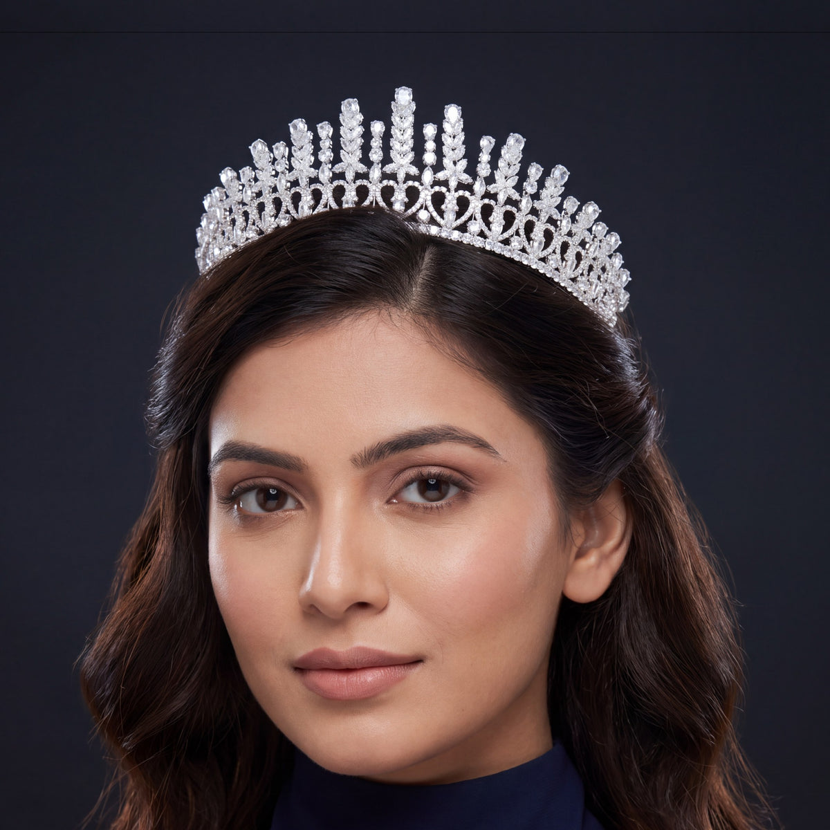 Grand openwork crown with repeated floral sprays and finely detailed framework