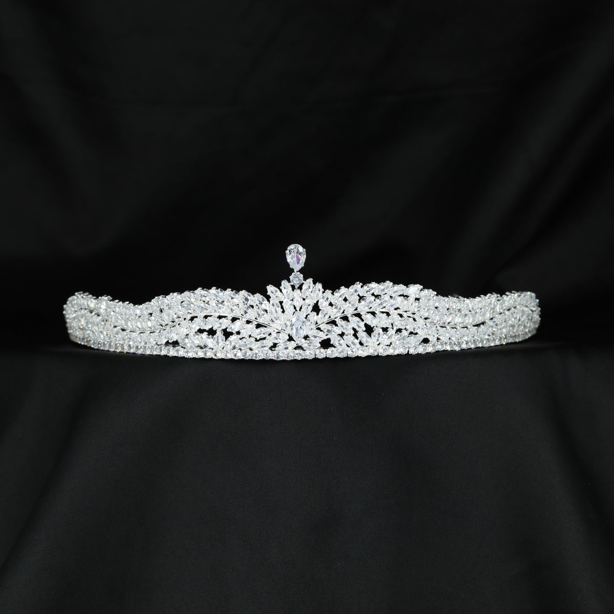 Delicate leaf inspired lattice crown with a graceful raised centre