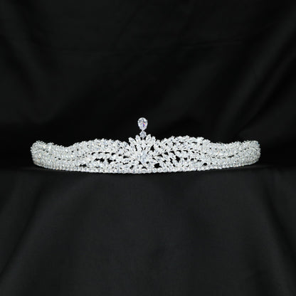 Delicate leaf inspired lattice crown with a graceful raised centre
