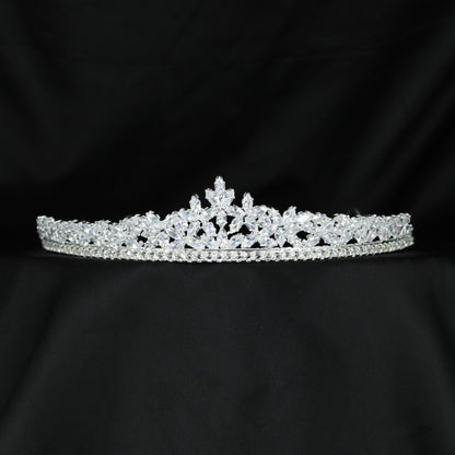 Floral crystal crown with delicate leaf clusters and a graceful symmetrical design