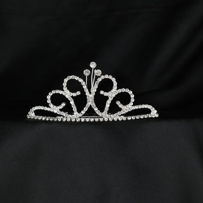 Classic ornamental crown with symmetrical scrollwork and delicate central accents