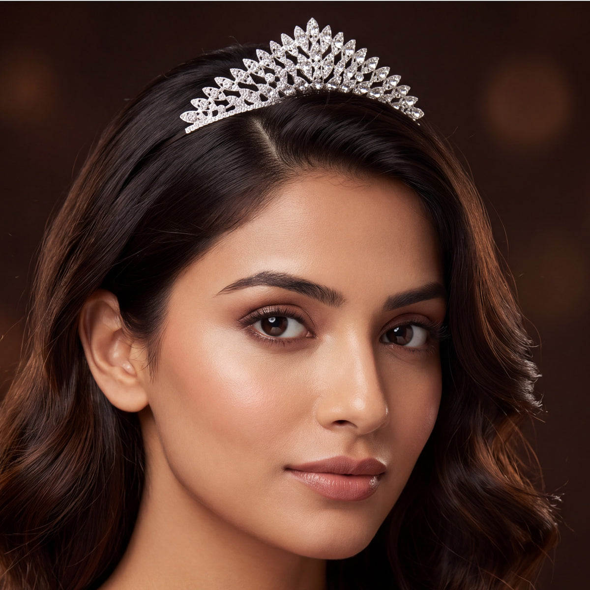 Floral foliage crown with pointed leaf elements and intricate sparkling accents