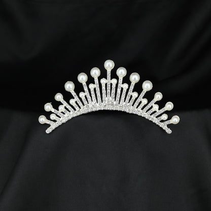 Pearl tipped radiant crown with sparkling crystal arches and elegant openwork detailing